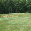 The par-3 sixth hole on the Pines Course at Seaview resort is a tricky carry over a bunker.
